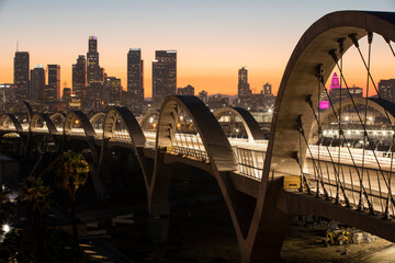 Twilight descends on the 6th Street Bridge as it passes through Downtown Los Angeles, California, USA. - obrazy, fototapety, plakaty