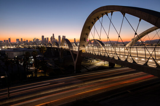 Twilight descends on the 6th Street Bridge as it passes through Downtown Los Angeles, California, USA.