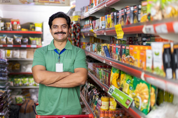 Salesman at grocery store products
