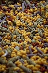 close up of a pile of colorful pasta