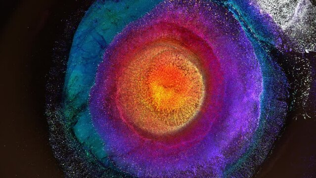 The explosion of liquid ink extra close up. The sun, Fireball, the cosmos and the Universe, the Big Bang, the Eye of God, the Nebula and the stars. 