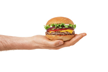 burger with cheese and beef in male hands on a white background