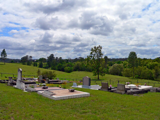 View of a country cemetery surrounded by trees