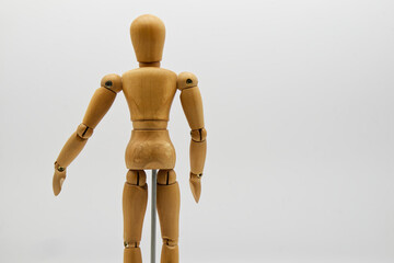 Wooden figure isolated on white background. Wood Figure Mannequin. Space for text.