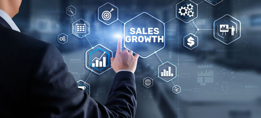 Sales Growth Man clicks inscription on virtual 3D screen