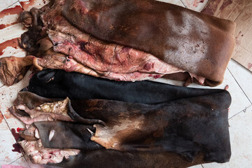 Cow skin as a material for making carpets, drums, wallets and belts, in Indonesia it can be made into leather cracker snacks.