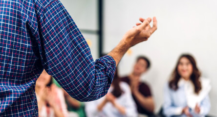 Businessman coach speaker presentation and discussing meeting strategy sharing idea.Creative team...