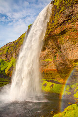 Fototapeta premium Amazing Seljalandsfoss waterfall with rainbow - Iceland