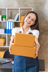 Entrepreneurs Small Business SME, Young Asian women happy after a new order from the customer,...
