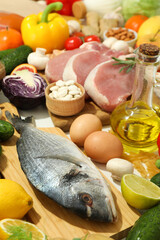 Different grocery on white table, close up