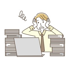 仕事に追われる男性会社員