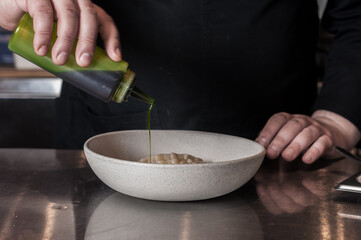 chef preparing plate of asian cuisine food