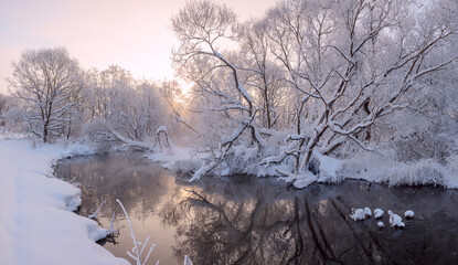 Winter scene with calm forest river 