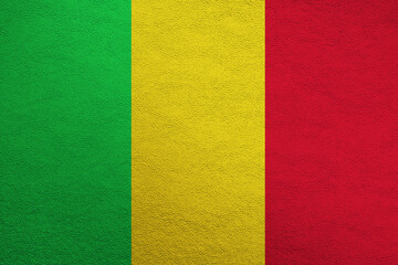 Modern shine leather background in colors of national flag. Mali