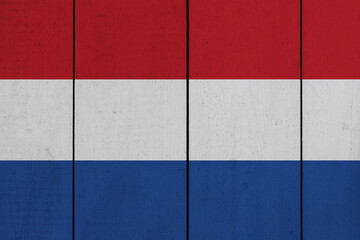 Patriotic wooden plank background in colors of flag. Netherlands