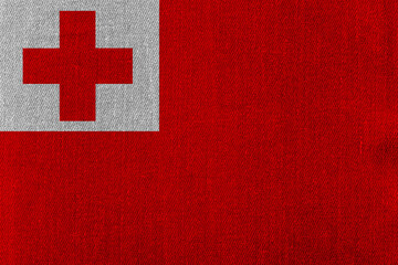 Patriotic classic denim background in colors of national flag. Tonga
