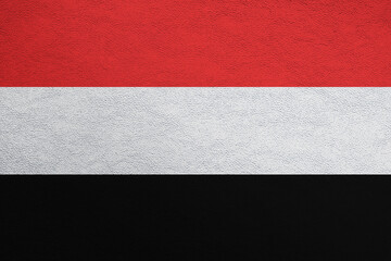 Modern shine leather background in colors of national flag. Yemen