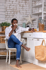 African American black man cooking breakfast or lunch on kitchen at home. Healthy food concept.