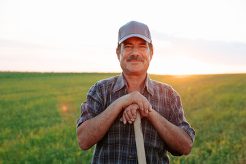Old farmer with mustache handsome man looking at camera