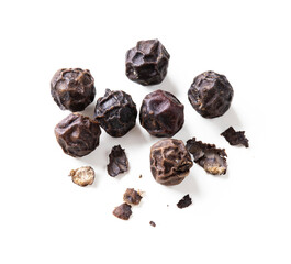 Peppercorns isolated on white background. Black peppers macro top view with clipping path.