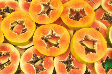 Sliced papaya fruits background	