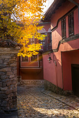Fototapeta na wymiar Plovdiv, Bulgaria colorful medieval houses, street in the old town