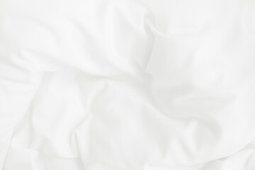 Obraz premium Texture of white blanket and bedding sheet with crumpled or messy in bedroom after wake up.