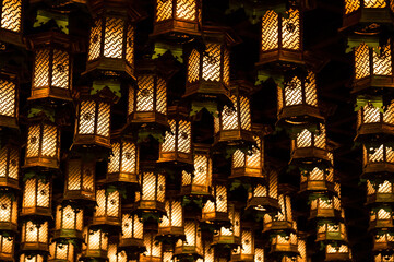 Many lanterns hung on the ceiling of Daishoin in Miyajima, Hiroshima, Japan