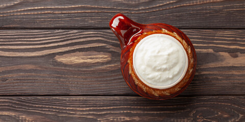 Plain curd or yogurt or Dahi. Traditional Indian fermented milk sauce. Top view
