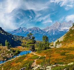 Fototapeta na wymiar Autumn Alps mountain lake Spiegelsee or Mittersee or Mirror Lake, Austria.