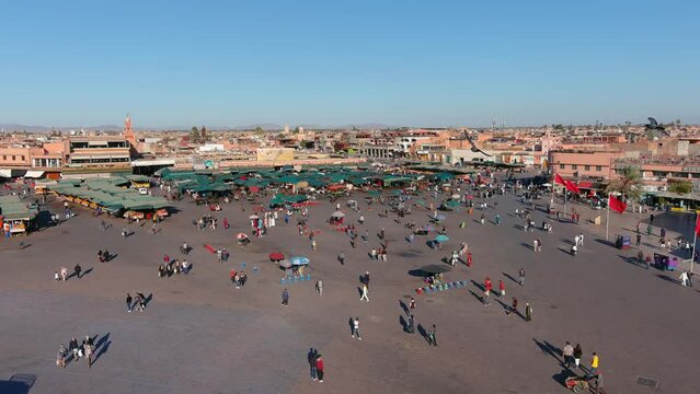 
Aerial view over Marrakech market Jemaa el-Fnaa, 2022

Jemaa el-Fnaa is a square and market place in Marrakesh's medina quarter (old city), drone view, Marrakech Morocco, July,06,2022 

