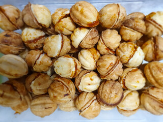 close up of a plate of delicious food, baked nuts with condensed milk