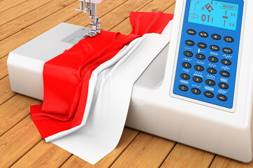 Sewing machine with Indonesian, Monacan flag on the wooden table. 3D rendering