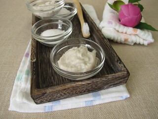 Homemade toothpaste from three ingredients with coconut oil, xylitol and chalk powder