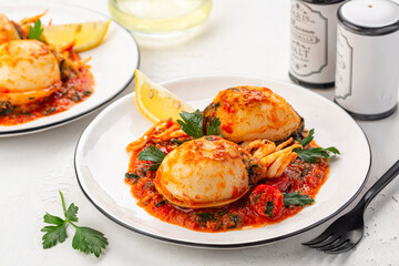 Dinner with Sepia, calamari or Cuttlefish stuffed with swiss chard, bread crumbs and parmesan...