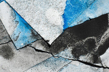 Stained ripped paper texture. Grunge art background. Worn page stack. Black blue paint grain dust...