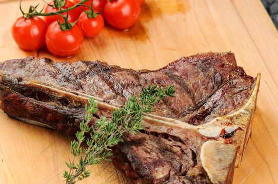 a large tibon steak on a board
