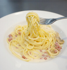 Spaghetti Carbonara Italian cuisine on dish