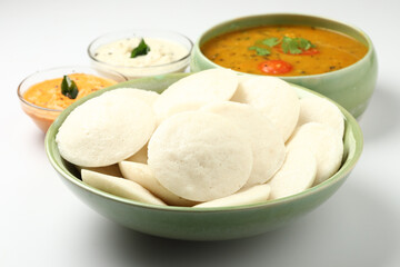 Fototapeta na wymiar Traditional breakfast of South India IDLY served with sambar & Chutney