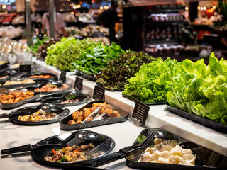 The salad bar is sold on the counter.