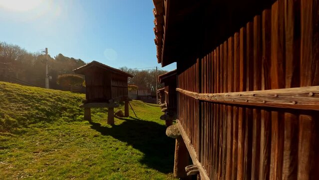 A Merca spanish town wooden granaries establisher, dolly in, sunny day