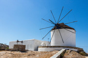 Fototapeta na wymiar Ios Greece. 06-09-2022. Old traditional windmill at Ios. Cyclades Islands Greece.