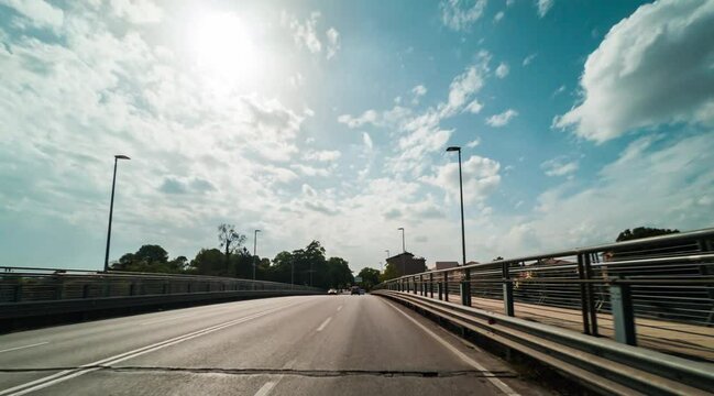 Timelapse red car driving on the road. Cars go on high-speed
