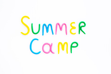 Words Summer Camp made of colorful clay. Summer kids vacation concept