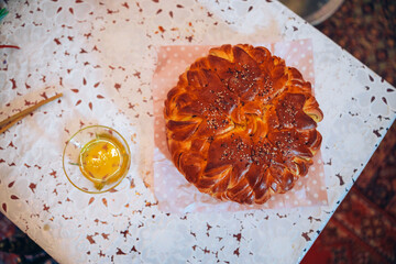 Traditional ritual bread and honey for a baptism in Bulgaria. Tasty traditional cake bread food....