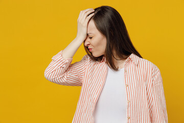 Young mistaken woman she 30s wears striped shirt white t-shirt put hand on face facepalm epic fail...