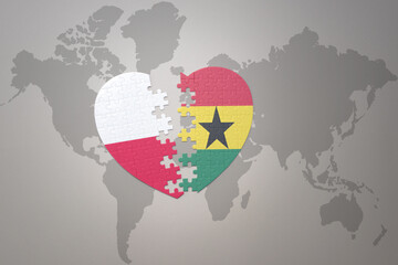 puzzle heart with the national flag of ghana and poland on a world map background.Concept.