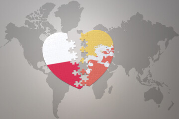 puzzle heart with the national flag of bhutan and poland on a world map background.Concept.