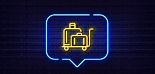 Neon light speech bubble. Luggage trolley line icon. Suitcase bag sign. Baggage claim symbol. Neon light background. Luggage trolley glow line. Brick wall banner. Vector