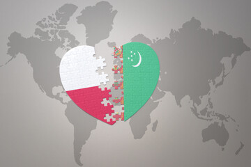 puzzle heart with the national flag of turkmenistan and poland on a world map background.Concept.